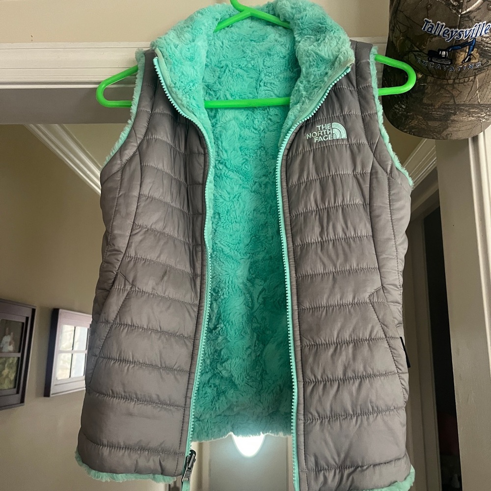 Reversible fleece and puffer vest, The North Face